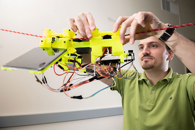 A man working on mechanical parts